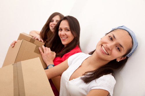 Professional packers handling belongings in Storage Edgware