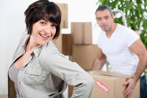 Professional movers loading a truck for relocation.